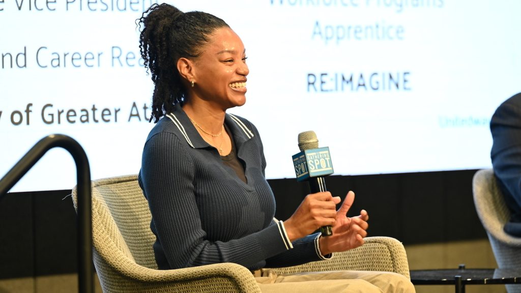 Leah McLaurin speaks at a CareerReady ATL event, highlighting how apprenticeship opportunities can be life-changing for Atlanta youth.